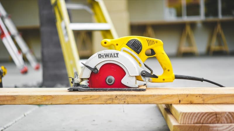Circular saw on lumber at an outdoor job site